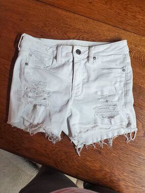 American Eagle distressed white denim shorts